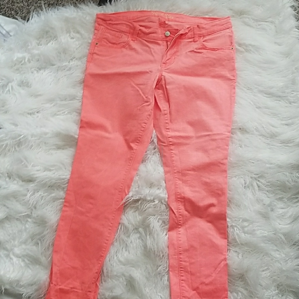 Neon pink skinny jeans